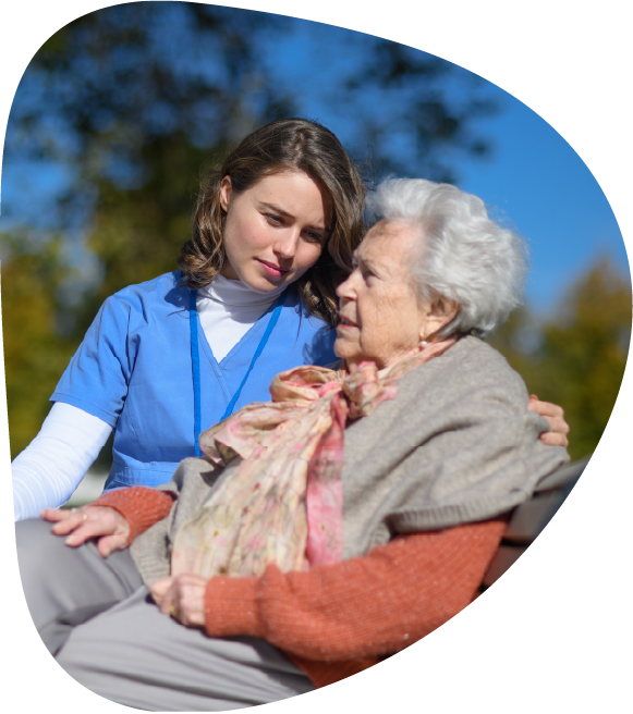 Nurse caring for an elderly woman