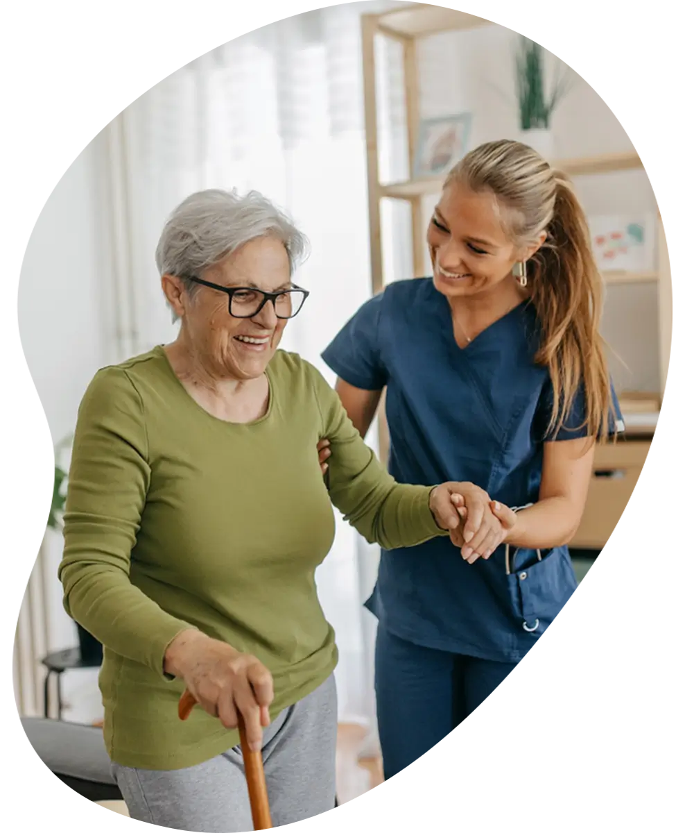 Nurse caring for an elderly woman